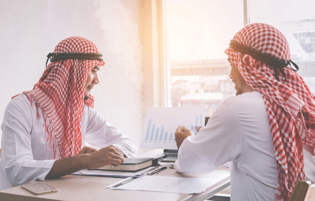 Business professionals discussing advisory and setup consultation in Saudi Arabia for successful company registration and growth.